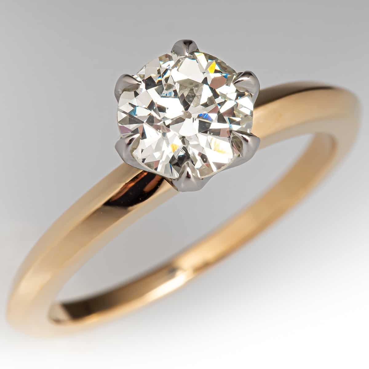 0.90-carat VS2 M color diamond engagement ring in platinum prong and 14k gold knife edge setting 0.90-carat VS2 M color diamond engagement ring in platinum prong and 14k gold knife edge setting